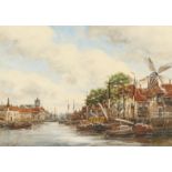 Jan Van Couver (1864-1910) Dutch, A Dutch Port scene with moored boats and buildings, watercolour,