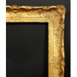 An early 20th century gilt composition frame, rebate size 16 x 20 , 40.5 cm x 51 cm.