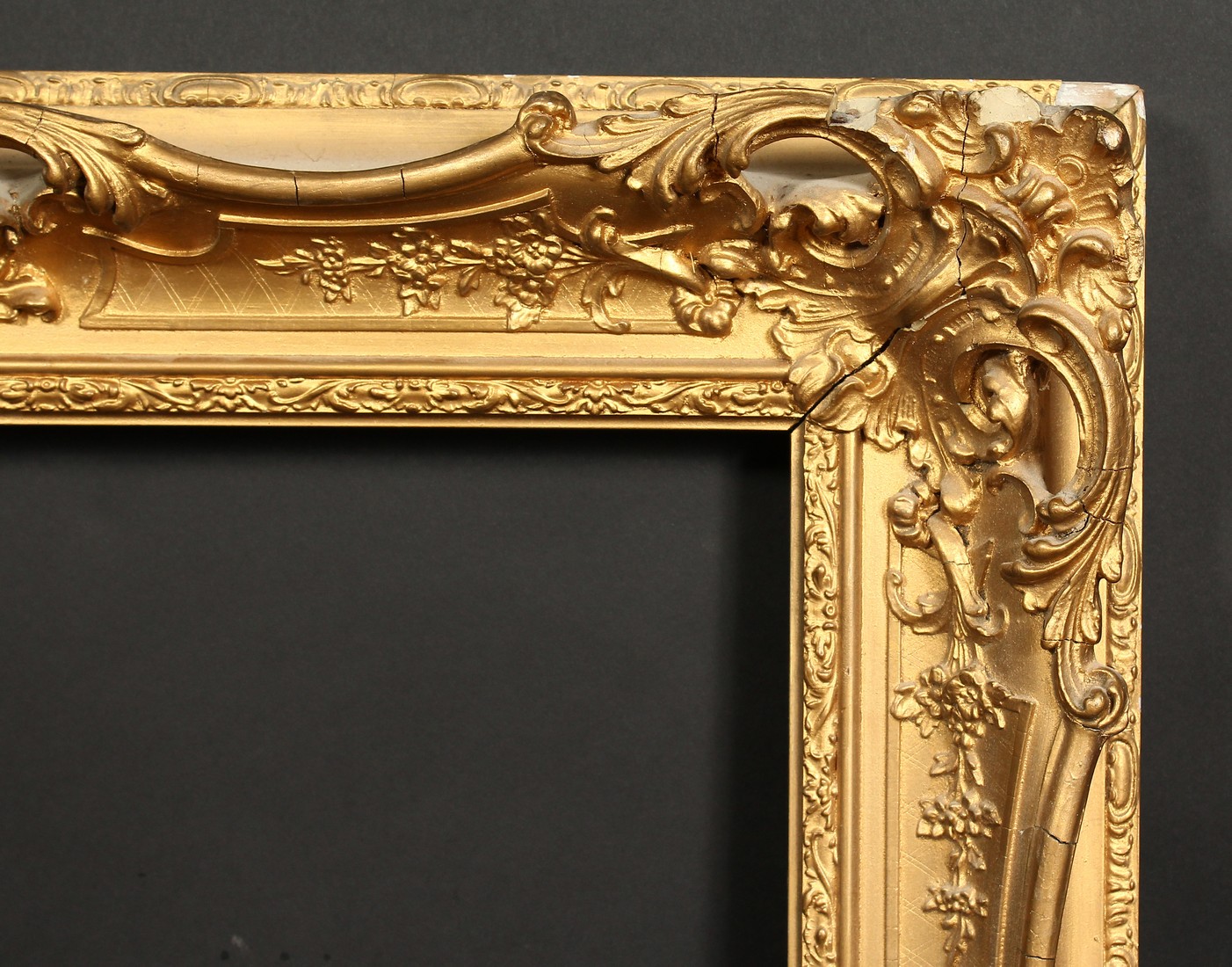 A 19th century gilt composition swept frame, rebate size 22.5 x 35.5 , 57cm x 90cm.