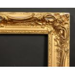 A 19th century gilt composition swept frame, rebate size 22.5 x 35.5 , 57cm x 90cm.
