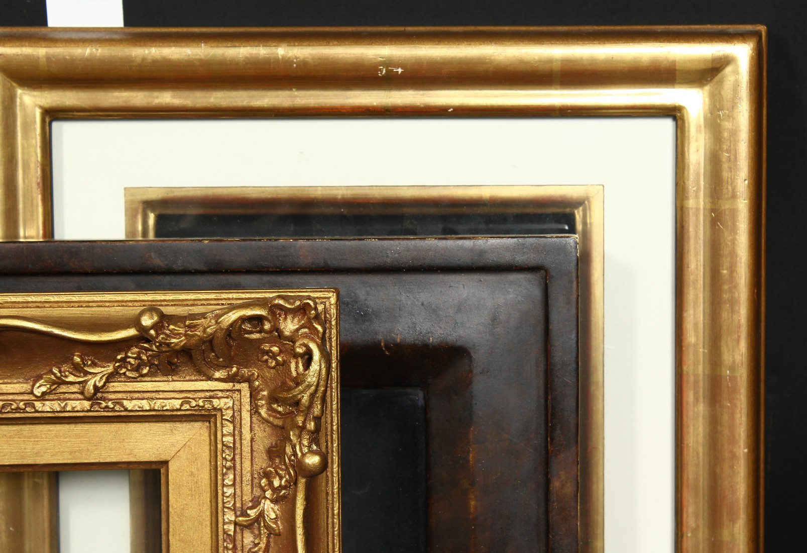 A group of three 20th century frames, rebate sizes 6.5 x 8 , 16.5xm x 20cm, 8.5 x 11.5 , 21.5cm x