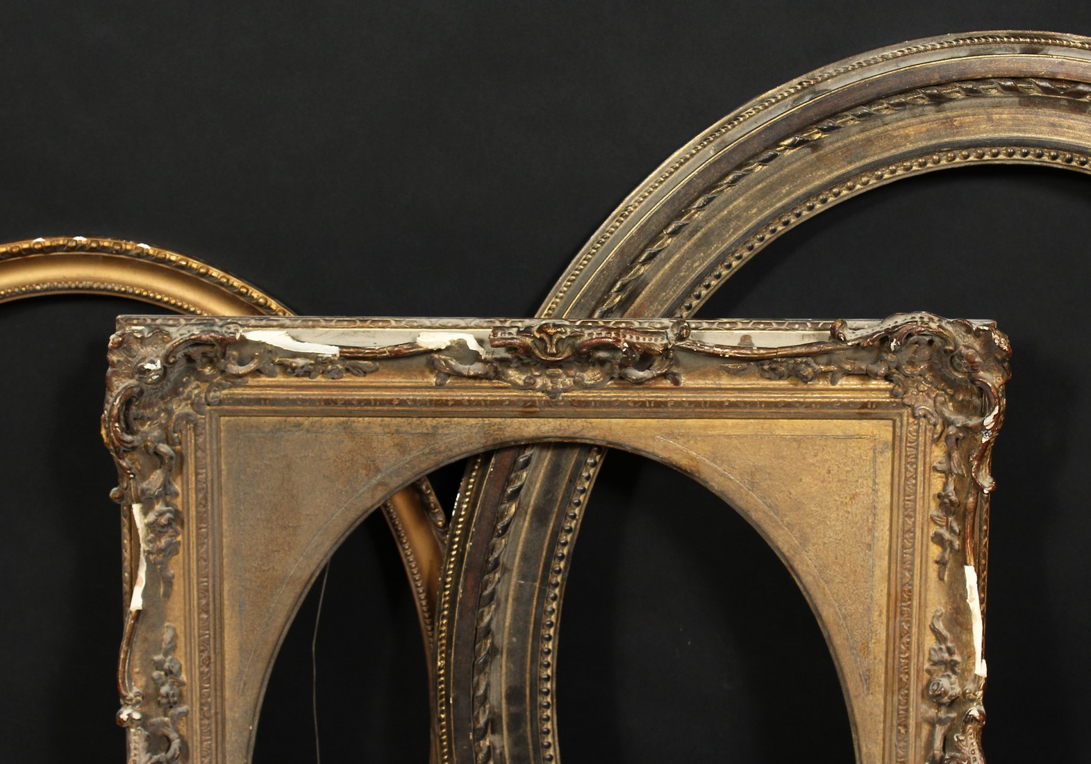 A group of three 19th century and later oval frames, rebate sizes 24.25 x 18.25 , 62cm x 47cm, 27