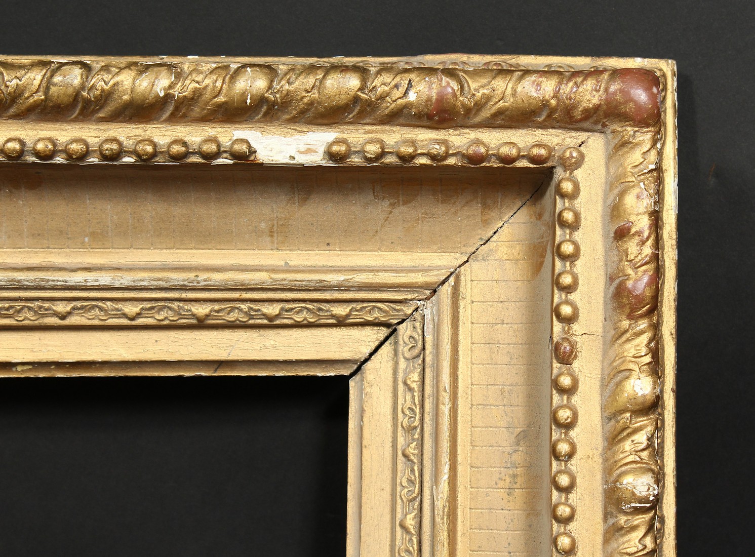 A 19th century gilt composition frame, rebate size 10 x 15 , 25.5cm x 38cm.