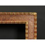 A Burr wood frame with ripple moulding, rebate size 23 x 29.25 , 58.5cm x 74cm.