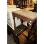 A carved oak table.