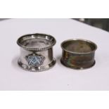 Two silver napkin rings.