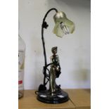 An Art Nouveau style table lamp.