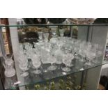 A quantity of Edinburgh Crystal cut glass and etched thistle shaped glassware to include three