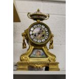 A good French ormolu and porcelain mantle clock.