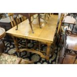 A good large oak draw leaf dining table.