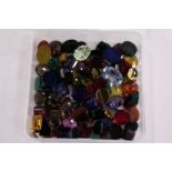 A box of loose coloured stones.