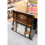 A Victorian walnut overmantle mirror.