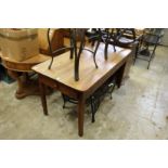A good 19th century elm plank top kitchen table with a drawer to each end.