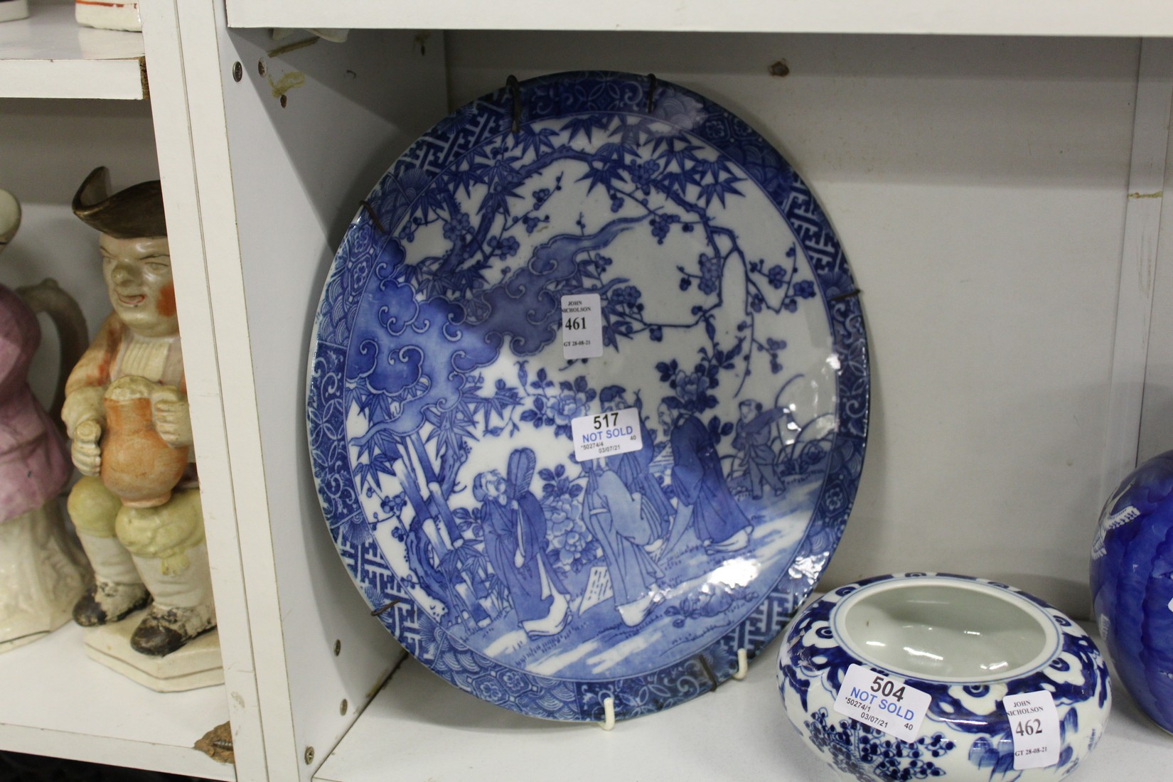 A Japanese blue and white decorated porcelain plate.