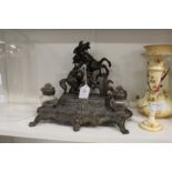 A decorative spelter inkstand.