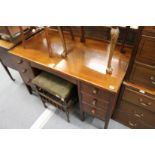 An oak pedestal desk.