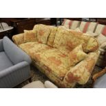 A good large classical upholstered two-seater settee.