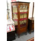 An Edwardian mahogany display cabinet.