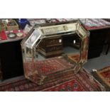 A Venetian style mirror.