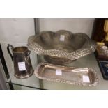 A plated wirework basket and two other items.