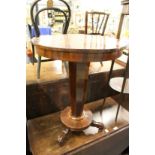 A Victorian rosewood circular occasional table.