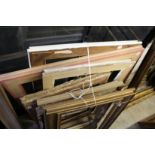 A quantity of picture frames.