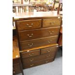 A pair of military style chests of drawers.