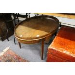 A George III style mahogany tray top oval coffee table.