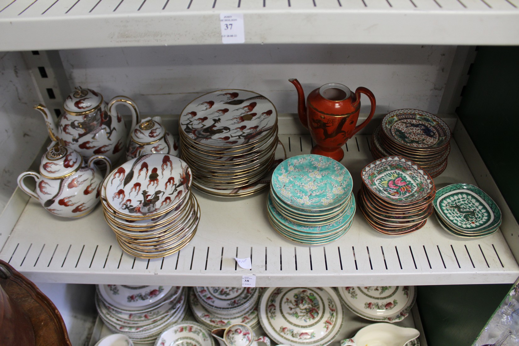 A shelf of oriental china.