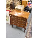 A matching chest of drawers.