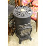 A modern stove style heater.