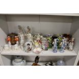 Decorative ornaments and a Doulton tobacco jar.