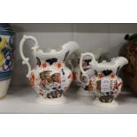 A graduated set of three Imari decorated jugs from the Murray collection.