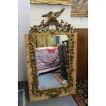 An 18th / 19th century carved giltwood mirror with Ho Ho bird cresting (later gold painted.