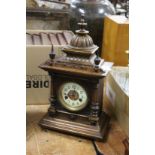 A walnut mantle clock.