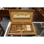 A humidor containing various cigars.