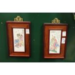A pair of small Chinese porcelain plaques, framed.