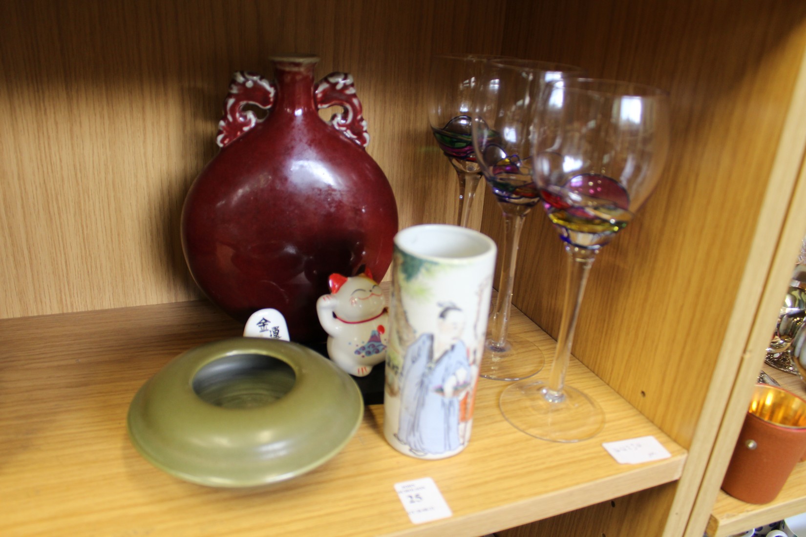 Chinese ceramics and decorative drinking glasses.