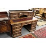 A good Victorian carved oak kneehole desk.