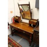 A Victorian walnut dressing table.