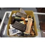 A quantity of cigarette lighters, cigar cutters, cigar cases and other smoking related items.