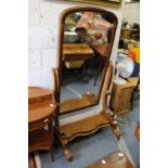 A Victorian mahogany cheval mirror.