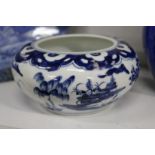 A Chinese blue and white circular bowl.