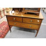 A mahogany chest of drawers.