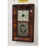 A 19th century American wall clock.