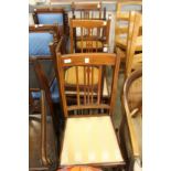 Five Edwardian mahogany dining chairs.