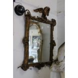 A good decorative 19th century gilt framed mirror with eagle cresting.