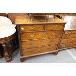 An 18th century walnut chest of drawers.