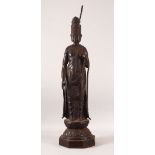 A LARGE CHINESE BRONZE STATUE LAMP, the figure with one hand raised (lacking object in hand),