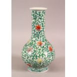 A SMALL CHINESE FAMILLE VERTE PORCELAIN VASE, profusely painted with flowers and vines, six